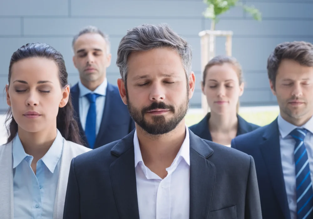 group-business-people-with-eyes-closed